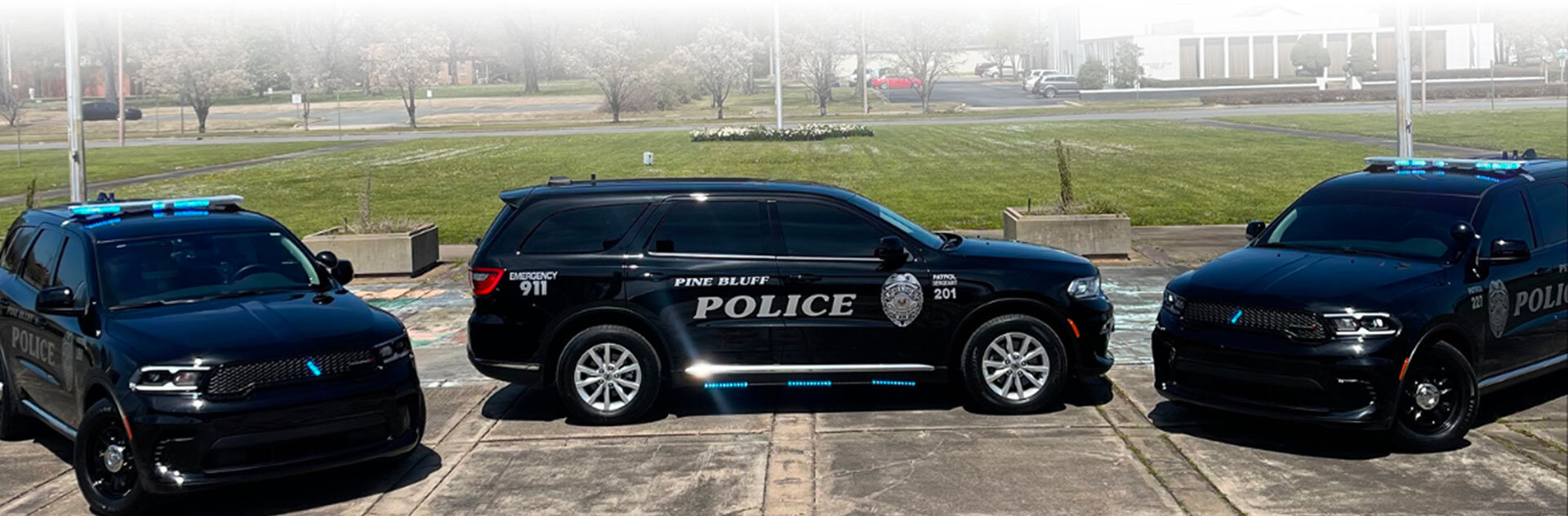 Three Pine Bluff Police Department Vehicles